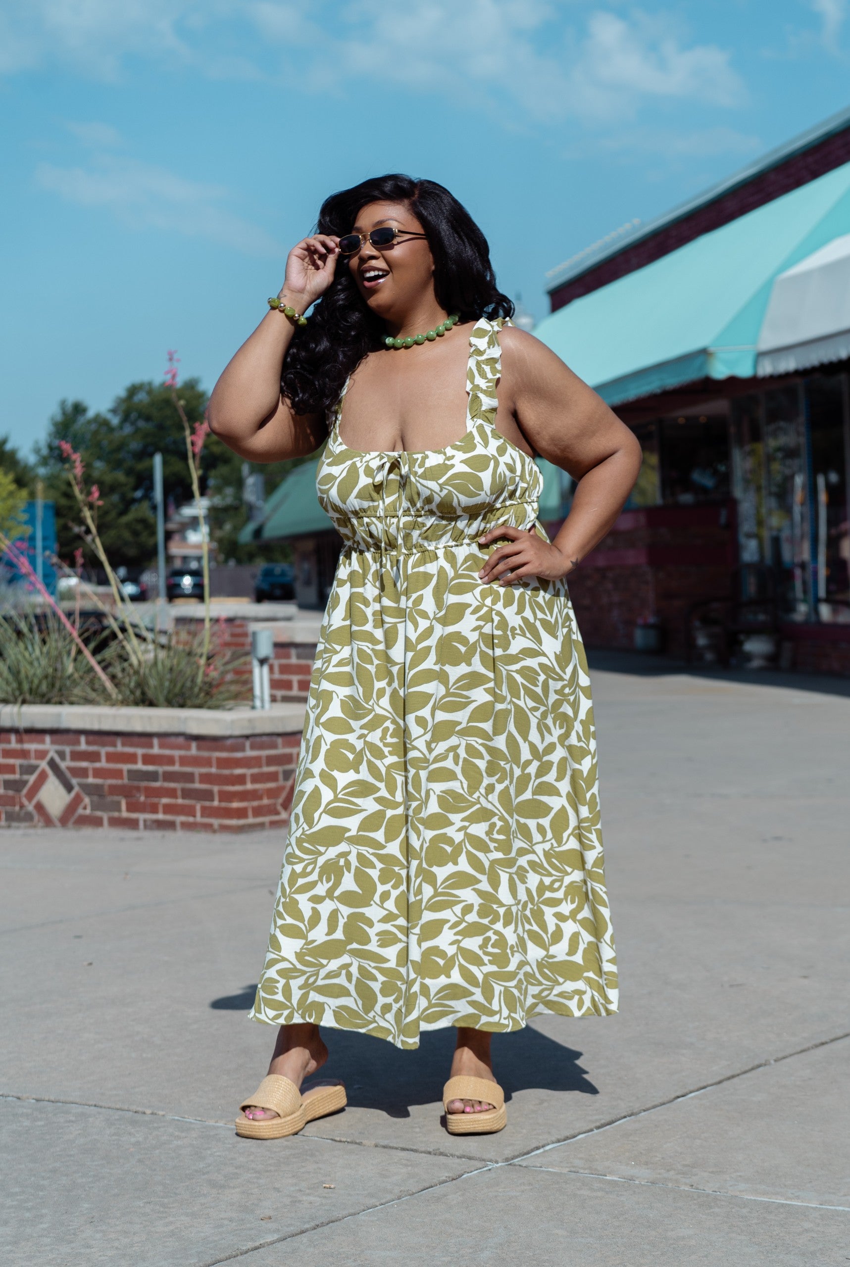 green leaf dress Foil Short Sleeve Gown With Draped Details In Pine Gold ADRIANNA PAPELL Imported Spot Clean Main Fabric Content FARM Rio Green Monstera Dress